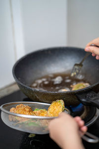 Midsection of person preparing food