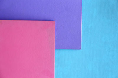 High angle view of multi colored paper on wall