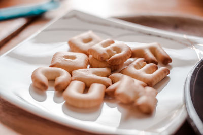 Close-up of cookies in plate on table