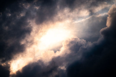 Low angle view of clouds in sky during sunset