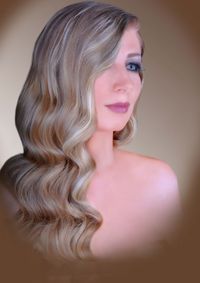 Close-up of young woman against white background