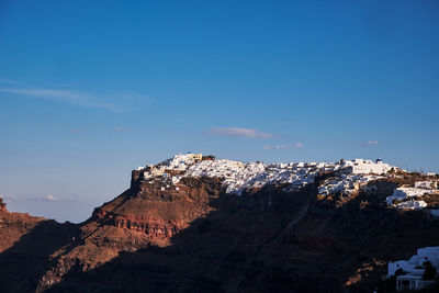 Panoramic aerial view of imerovigli village and skaros rock in santorini island, greece