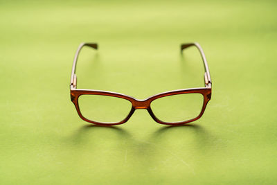 Close-up of eyeglasses on glass