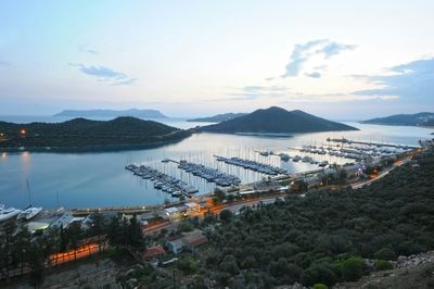 High angle view of sailboats moored in bay