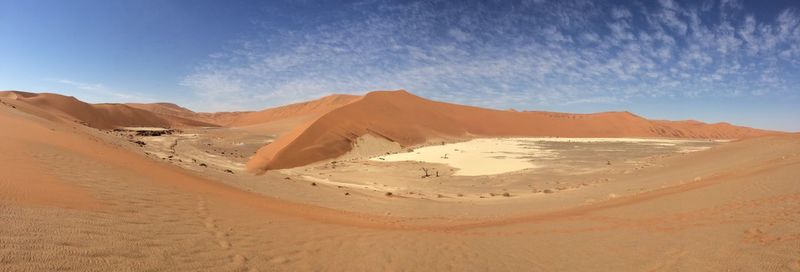 Panoramic view of desert against sky