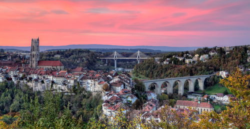 High angle view of townscape against sky at sunset