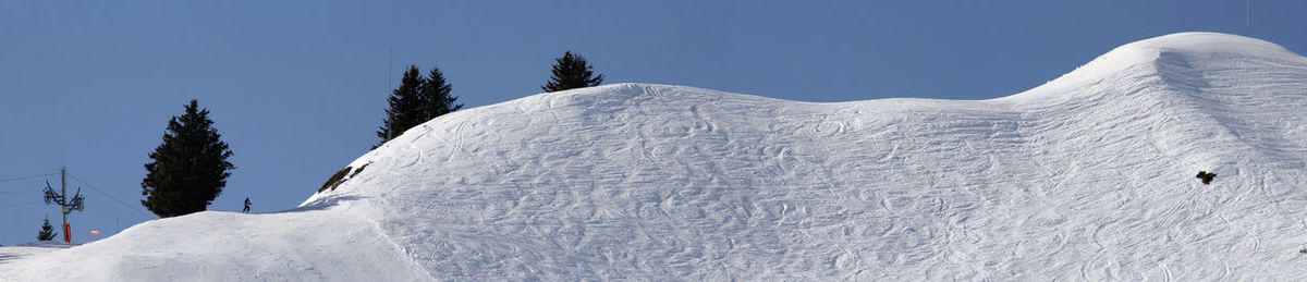 Snow covered mountain against sky