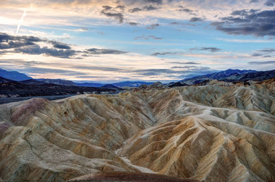 Scenic view of landscape against sky during sunset