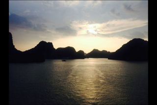 Scenic view of mountains against sky at sunset