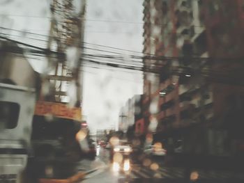 Blurred motion of vehicles on road in city