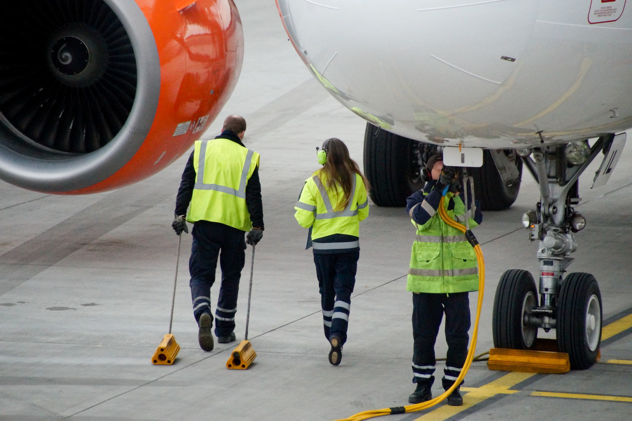 PEOPLE WORKING IN AIRPLANE