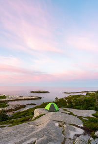 Camping along the atlantic coast in nova scotia at sunrise