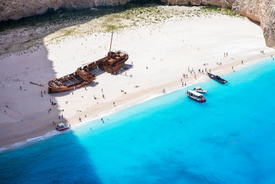 Aerial view of people enjoying at beach