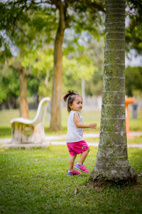 Cute girl standing at park