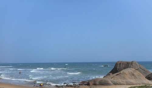 Scenic view of sea against clear blue sky