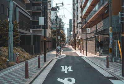 Street amidst buildings in city