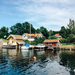 View of river with houses in background