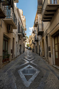 Street amidst buildings in city