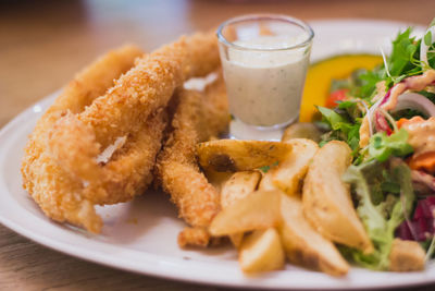 Close-up of food served on table