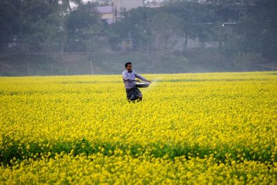 Man standing in field