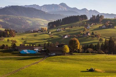 Scenic view of landscape and mountains against sky