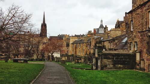 Panoramic view of buildings and houses against sky in city