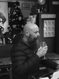 Man having drink at table