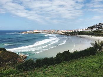 Scenic view of beach against sky