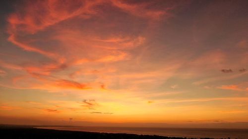 Scenic view of dramatic sky during sunset