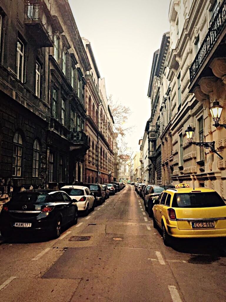 VIEW OF CARS ON CITY STREET