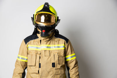 Man wearing mask against white background