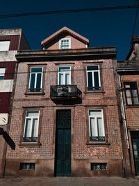 Low angle view of old building against sky