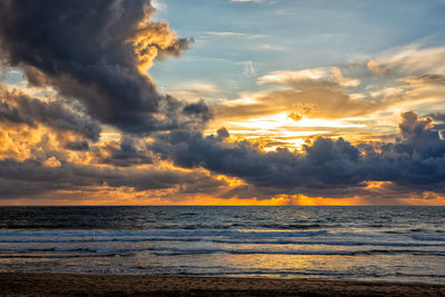 Scenic view of sea against sky during sunset