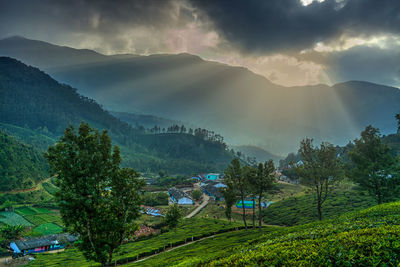 High angle view of trees and mountains against sky