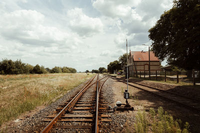 Railroad tracks against sky