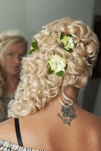 Close-up of woman wearing flowers