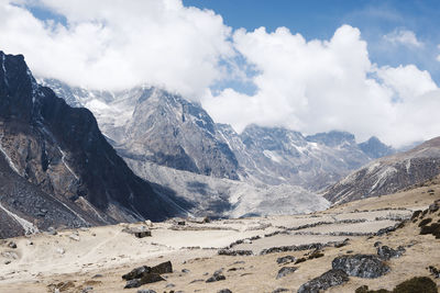 Scenic view of snowcapped mountains against sky