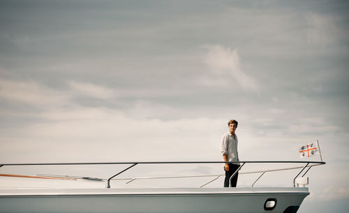 Full length of man standing against sky