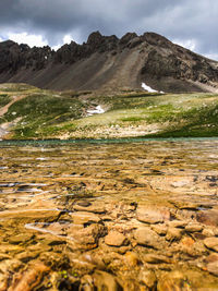 Scenic view of landscape and mountains against sky