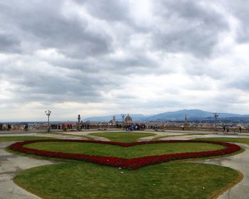 View of city against cloudy sky