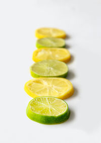 Close-up of fruits against white background