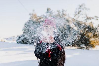 Portrait of woman in snow
