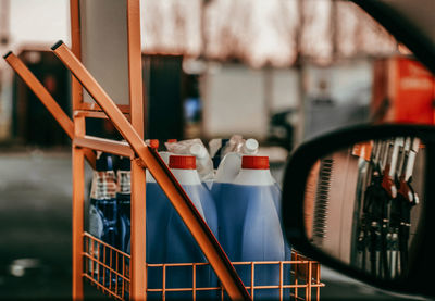 Close-up of chairs on table