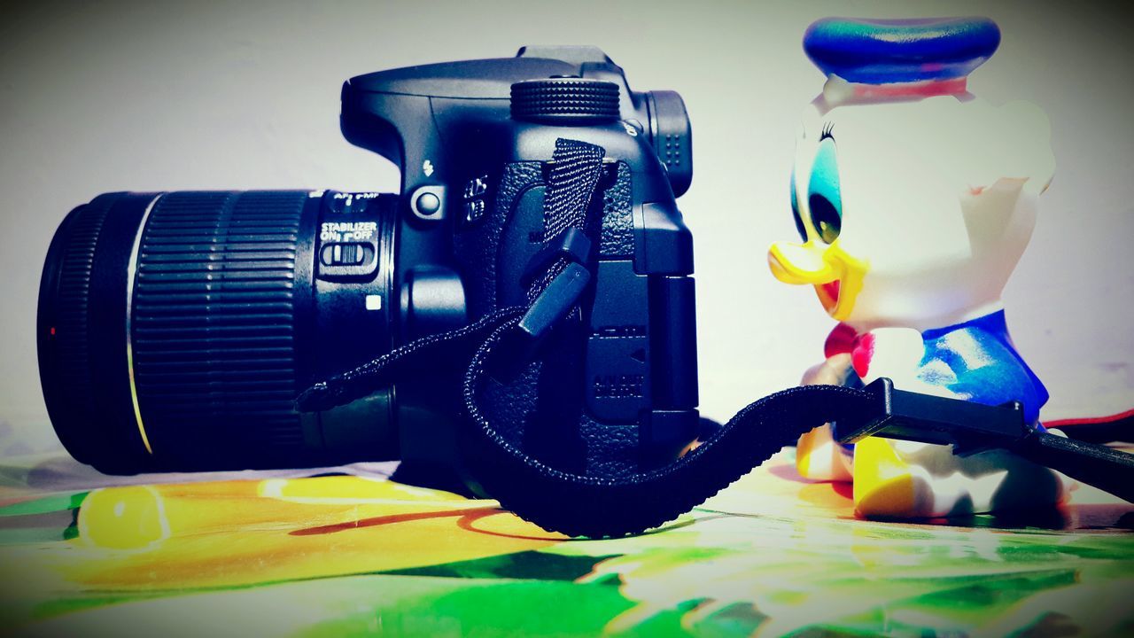 multi colored, yellow, art and craft, creativity, still life, toy, blue, art, indoors, close-up, no people, animal representation, auto post production filter, arts culture and entertainment, childhood, man made object, variation, human representation, day, sunlight