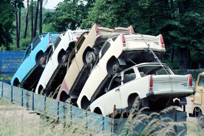 View of an abandoned car on the road