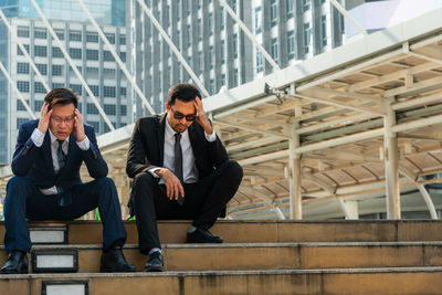 Men sitting in a office building