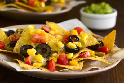 Close-up of food served on table