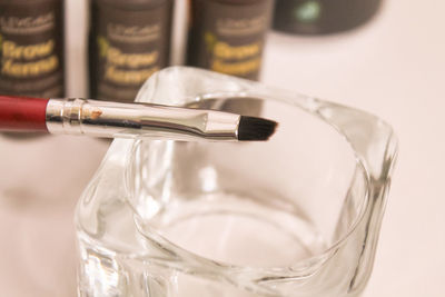 Close-up of beauty products on table