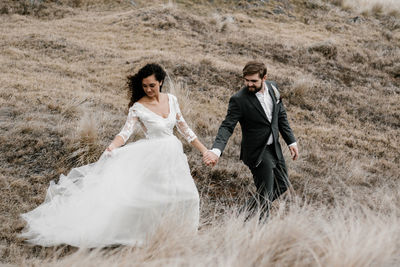 Young couple standing on land