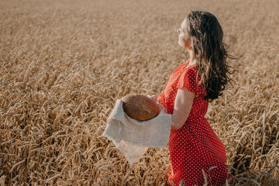 Rear view of woman in the field